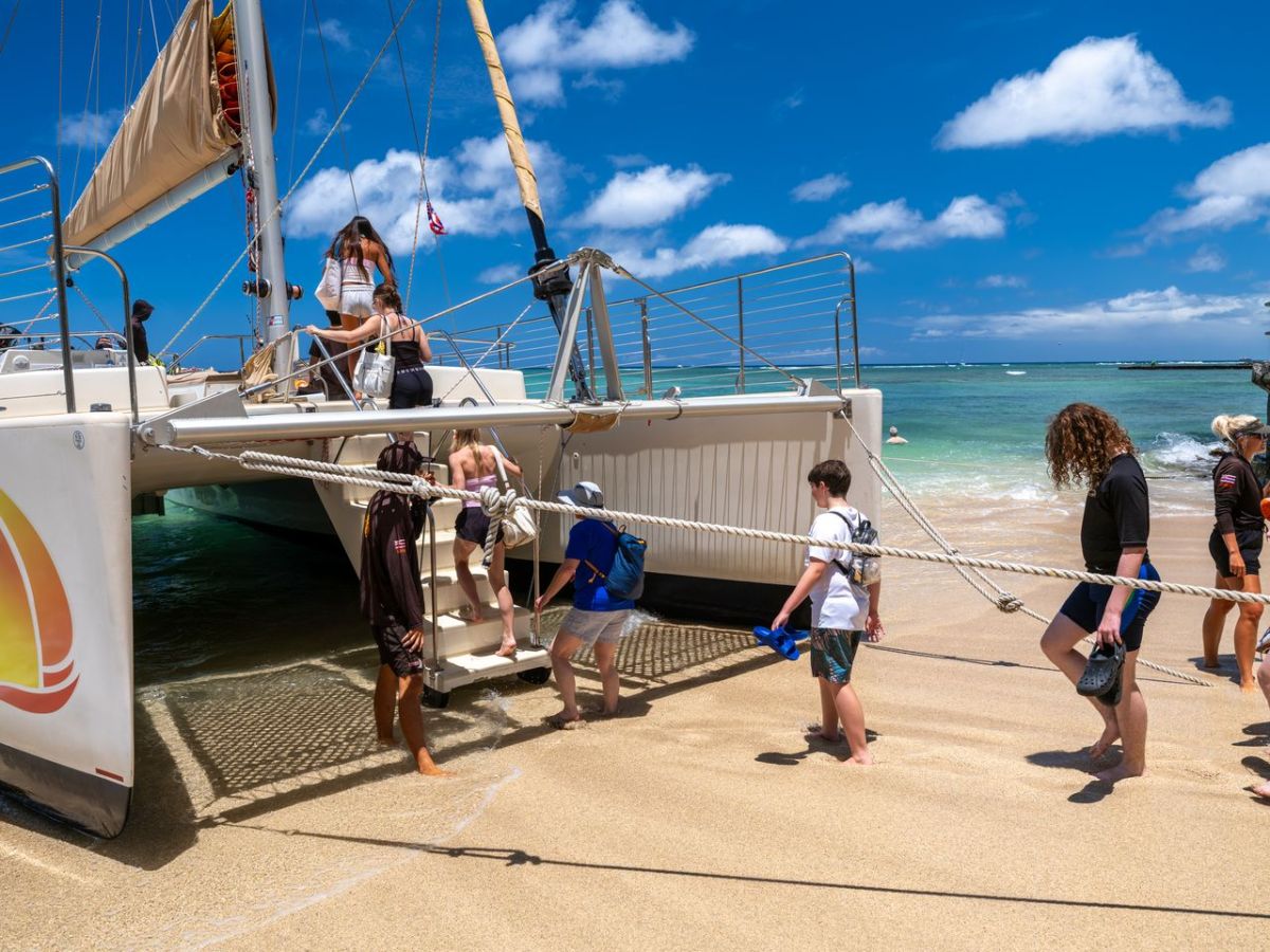 Boarding the Turtle Canyon Adventure sail from Waikiki Holokai Catamaran