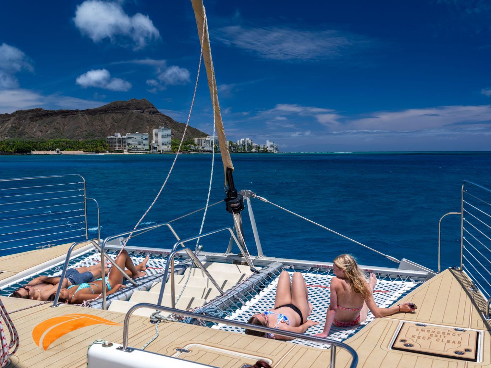 Netted seating area on front of Holokai Catamaran at Turtle Canyon