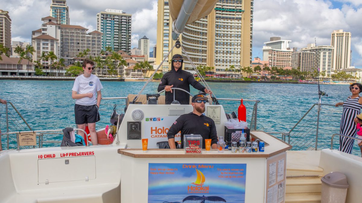 a group of people on a boat in the water