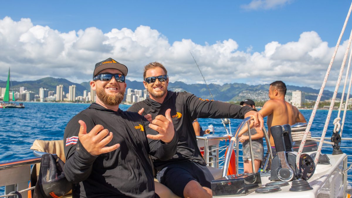 a man and a woman sitting on a boat